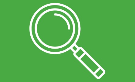 A white icon of a magnifying glass on a green background