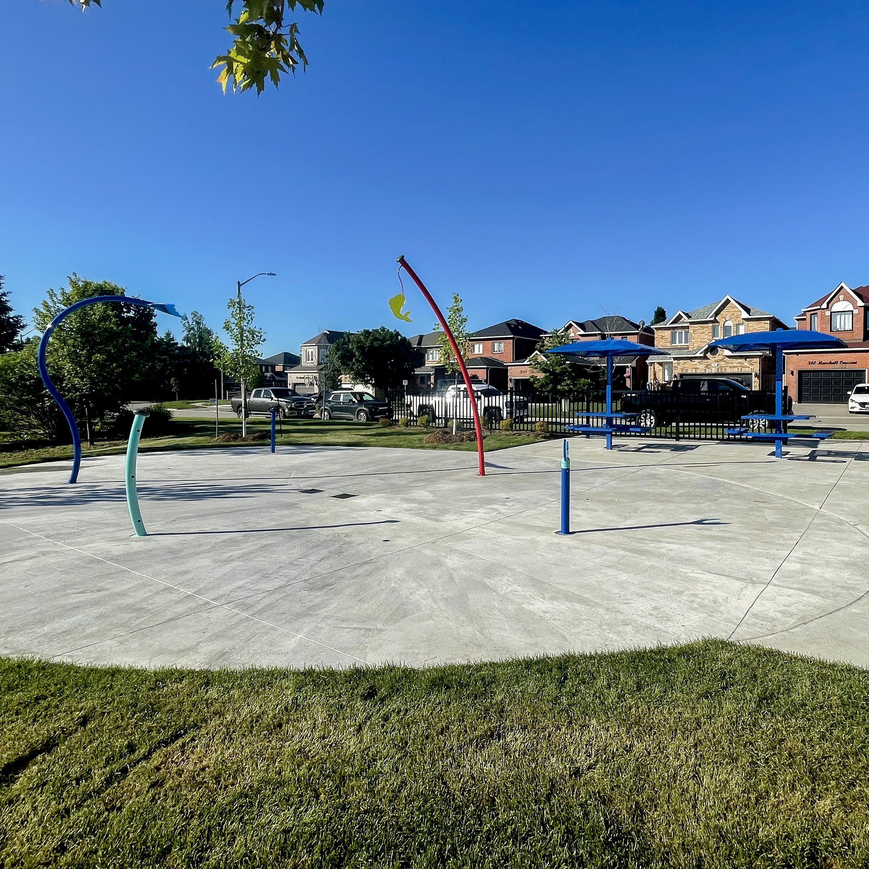 A photo of a splash pad with the water turned off